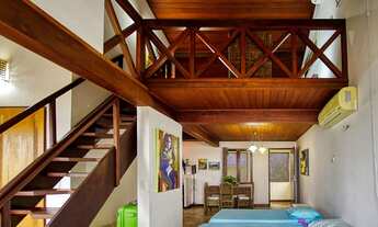 Imagem 7: Casa rústica com piscina e vista para a lagoa