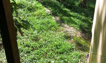 Imagem 7: Chalé para venda tem 35m2 com 1 quarto e 3500m2 de terreno com fundos pra cachoeira em San