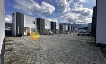 Imagem 2: Sobrado com 2 dormitórios à venda, 84 m² por R$ 390.000 - Rio do Ouro - Caraguatatuba/SP