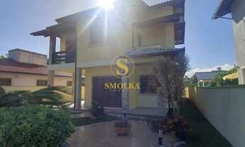 Imagem 2: Casa ampla com 3 dormitórios, área de lazer completa e localização estratégica nos Inglese