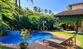 Imagem 4: Condomínio Jardim Acapulco Guarujá. Casa com construção sólida, muita madeira, espaços a