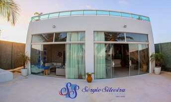 Imagem 7: Casa para venda no Porto das Dunas com 3 suítes piscina, deck com lareira