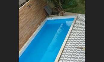 Imagem 7: Casa com piscina e poço artesiano