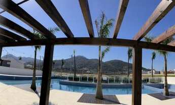 Imagem 7: Terrenos em condomínio fechado no bairro planejado Deltaville com lagos no fundo