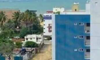 Imagem: Com vista mar lateral. PORTEIRA FECHADA