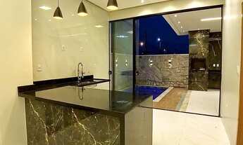 Imagem 3: Casa no Condomínio porto Marina, 3 suítes, Piscina com cascata e acabamento em pedras natu