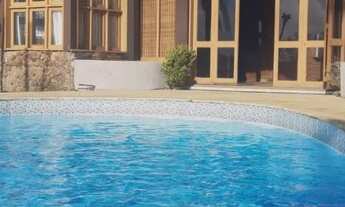 Imagem 4: Casa para venda tem 500 metros quadrados com 5 quartos em Centro - Torres - RS