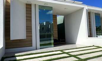 Imagem 2: Casa Plana em condomínio Fechado 100% Mobiliada e com energia solar sendo 03 suítes