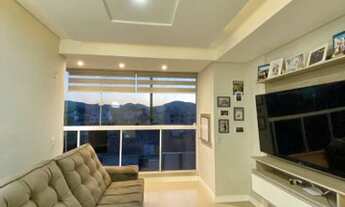 Imagem 2: Apartamento semi mobiliado com sacada e churrasqueira, cozinha americana, terraço e 01 vag