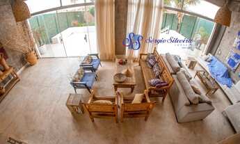 Imagem 2: Casa para venda no Porto das Dunas com 3 suítes piscina, deck com lareira