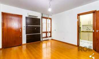 Imagem 2: Apartamento com 2 dormitórios e 1 vaga de garagem escriturada no bairro Rio Branco