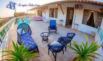 Imagem 4: Casa para venda no Porto das Dunas com 3 suítes piscina, deck com lareira