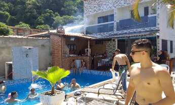 Imagem 2: Casa, praia e piscina