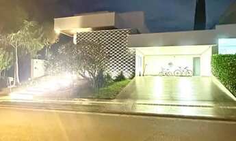 Imagem 2: Casa térrea localizada ao lado de uma rua de lazer condomínio Jardins Valência