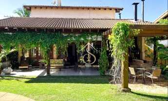 Imagem 3: Condomínio Jardim Acapulco Guarujá. Casa com construção sólida, muita madeira, espaços a