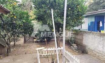 Imagem 6: Casa térrea à venda com 2 dormitórios e 5 vagas de garagem, em Porto Alegre no bairro Sar