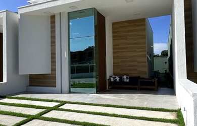 Imagem 3: Casa Plana em condomínio Fechado 100% Mobiliada e com energia solar sendo 03 suítes