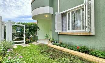 Imagem 6: Sobrado para venda com 139 metros quadrados com 3 quartos em Centro - Xangri-Lá - RS