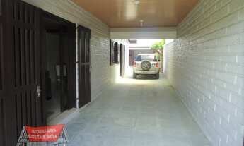 Imagem 4: Excelente casa com piscina, localizada no centro de Imbé