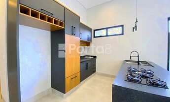 Imagem 7: Viva o Sonho da Vida Contemporânea: Casa Sofisticada com Piscina e Ambientes Planejados no