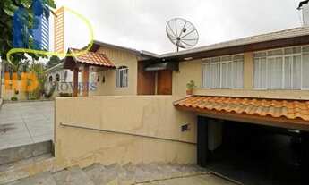 Imagem 3: Casa com terreno à venda no Novo Mundo - Curitiba/PR com 4 quartos e 4 vagas