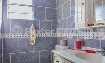 Imagem 7: Ótima casa de construção mista próxima a PUC. São 3 dormitórios com churrasqueira e forno