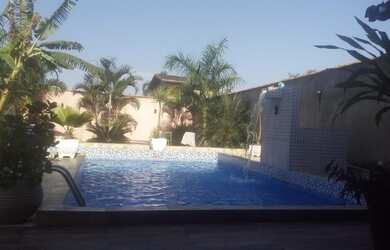 Imagem 7: Casa, praia e piscina