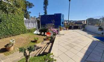 Imagem 5: Casa com 5 dormitórios à venda, 390 m² por R$ 2.000.000,00 - Três Figueiras - Porto Alegre