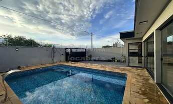 Imagem 4: Casa com 2 dormitórios com ares condicionados vagas de garagem e piscina