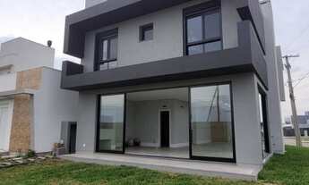 Imagem 4: Casa de condomínio para venda tem 199 metros quadrados com 4 quartos em Centro - Xangri-Lá