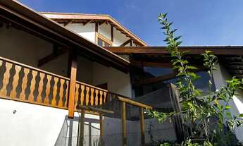 Imagem 2: Casa de condomínio para venda tem 284 metros quadrados com 3 quartos