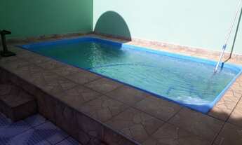 Imagem 7: Casa para venda possui 180m2 com 2 quartos com suítes, piscina, sauna e 2 vagas de garag