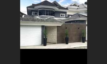 Imagem 2: Casa de condomínio para venda tem 230 metros quadrados com 3 quartos