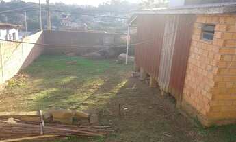 Imagem 3: Terreno com casa meia água