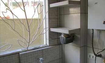 Imagem 5: Apartamento com 2 dormitórios para alugar, 52 m² por R$ 1.700,71/mês - Centro - Qua