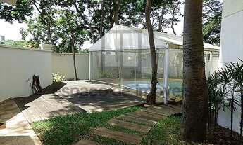 Imagem 2: Casa em condominio com jardim e piscina