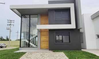 Imagem 2: Casa de condomínio para venda tem 199 metros quadrados com 4 quartos em Centro - Xangri-Lá