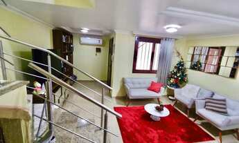 Imagem 3: Sobrado para venda possui 99 metros quadrados com 3 quartos em Igara - Canoas - RS