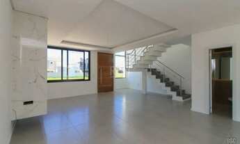 Imagem 4: Excelente sobrado com 3 dormitórios, sendo 1 suíte no bairro Aberta dos Morros