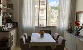 Imagem 5: Frente, sol manhã, andar alto, vista pão de Açúcar, predio muito bem cuidado com portaria