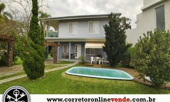 Imagem: Residência em condomínio fechado com marina