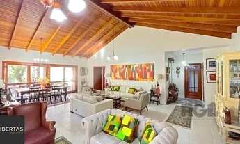 Imagem 5: Casa em Porto Alegre, no bairro Nonoai, com 4 dormitório(s), à venda