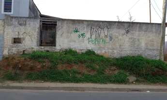 Imagem 2: Terreno com casa meia água