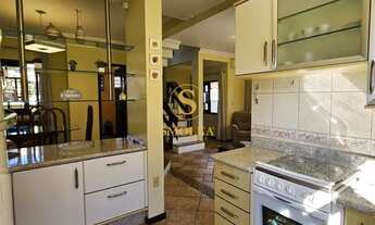 Imagem 7: Casa ampla com 3 dormitórios, área de lazer completa e localização estratégica nos Inglese