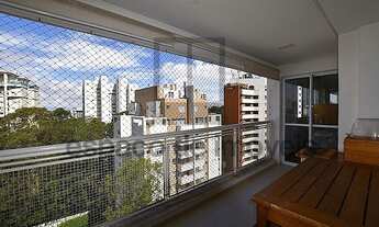 Imagem 1: Apartamento em rua arborizada, onde voce só ouve o canto dos pássaros