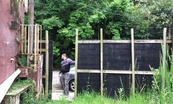 Imagem 2: Excelente terreno com toda infraestrutura , enfrente de área verde preservada com nascente