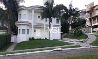 Imagem: Casa em condomínio, com 4 suítes, bairro