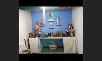 Imagem 2: Terreiro de umbanda com casa no segundo andar e terraço