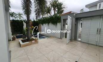 Imagem 2: Acabamento impecável. Casa com 4 quartos, sendo 3 suítes, pronta para morar. Piscina e chu