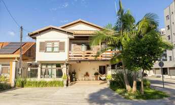 Imagem 2: Sobrado com 04 dormitórios sendo 01 suíte e 02 vagas de garagem Centro Matinhos